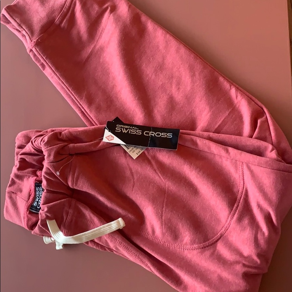 $34 Swiss cross men’s pink sweatpants